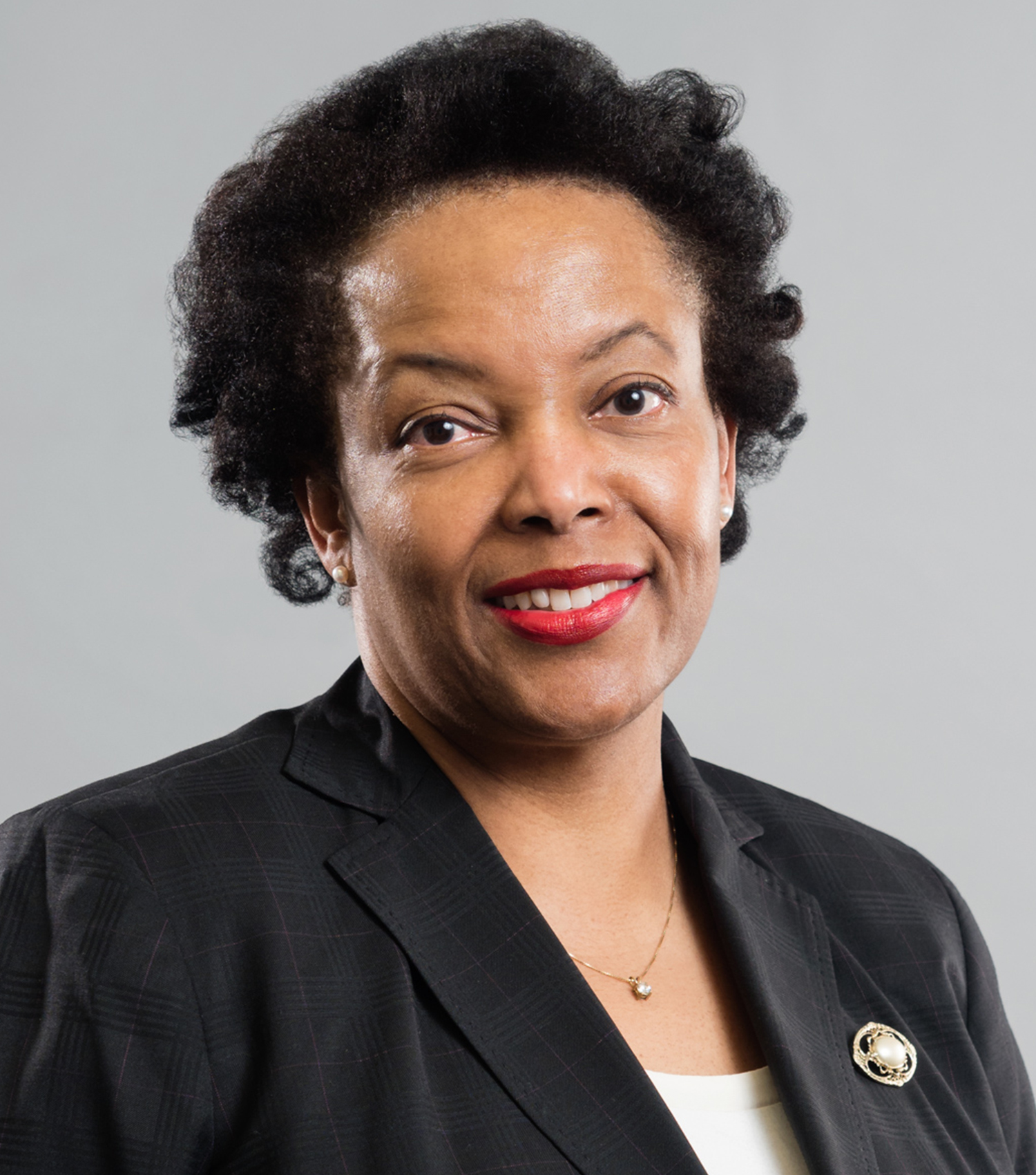 Tina E. Patterson, Commissioner